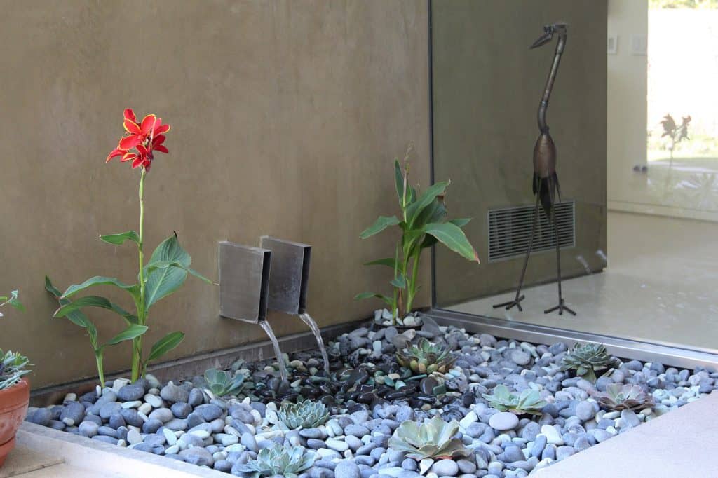 Fountain Maintenance - Disappearing fountain with stainless steel spouts