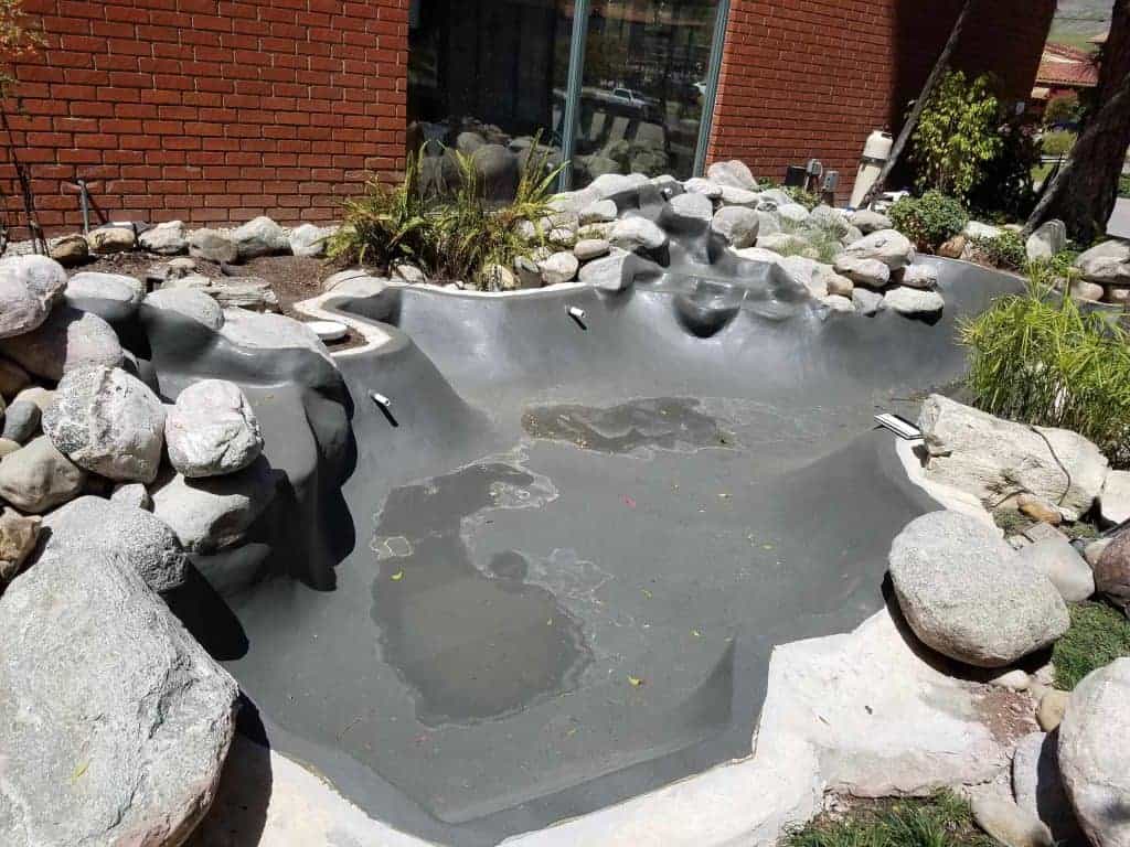 Hippo pond with polyurea spray on liner